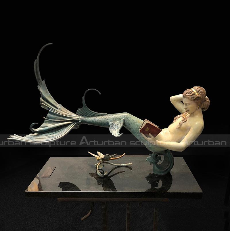 mermaid lying down statue
