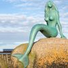 mermaid on rock statue
