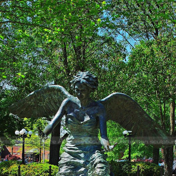 kneeling angel statue