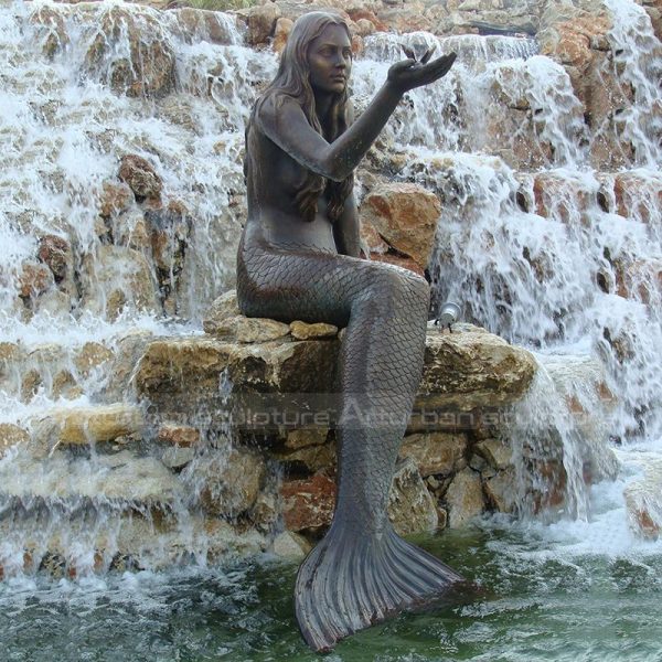 Sitting mermaid statue