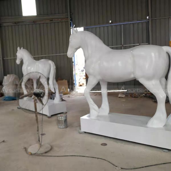White marble horse is an exquisite natural marble white horse statue. This sculpture has natural yellow patterns, which adds rich connotation to the simple color