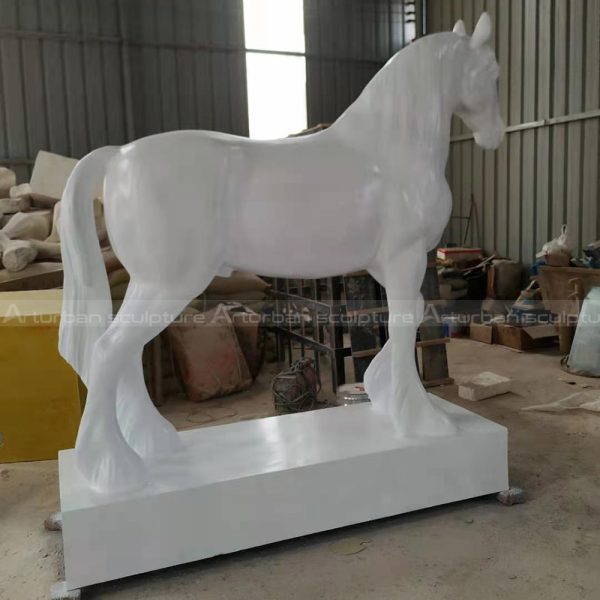 White marble horse is an exquisite natural marble white horse statue. This sculpture has natural yellow patterns, which adds rich connotation to the simple color