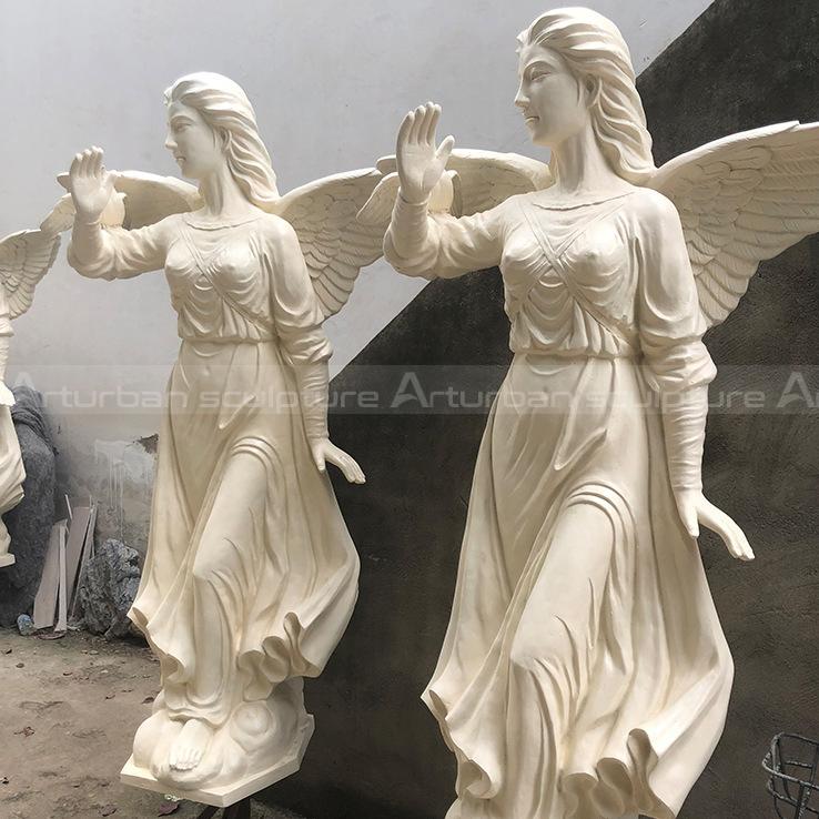 fiberglass angel statue with brid