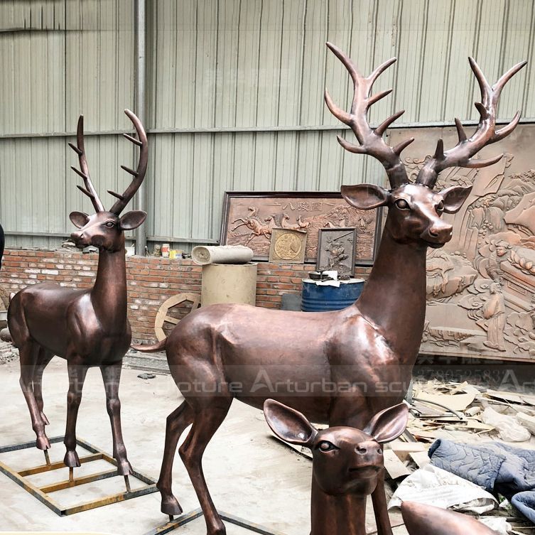 life size deer family statues