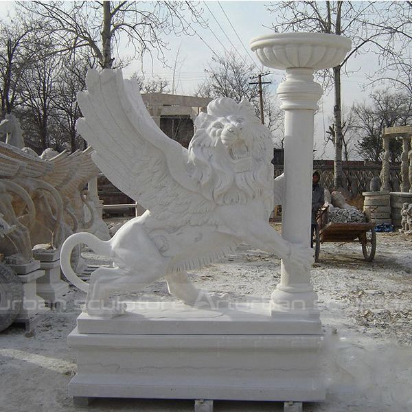 white marble lion statue with flowerpot
