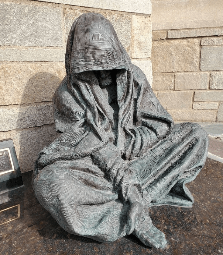jesus the beggar statue
