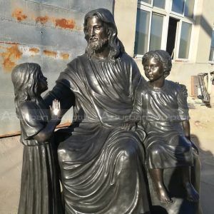 jesus with children statue