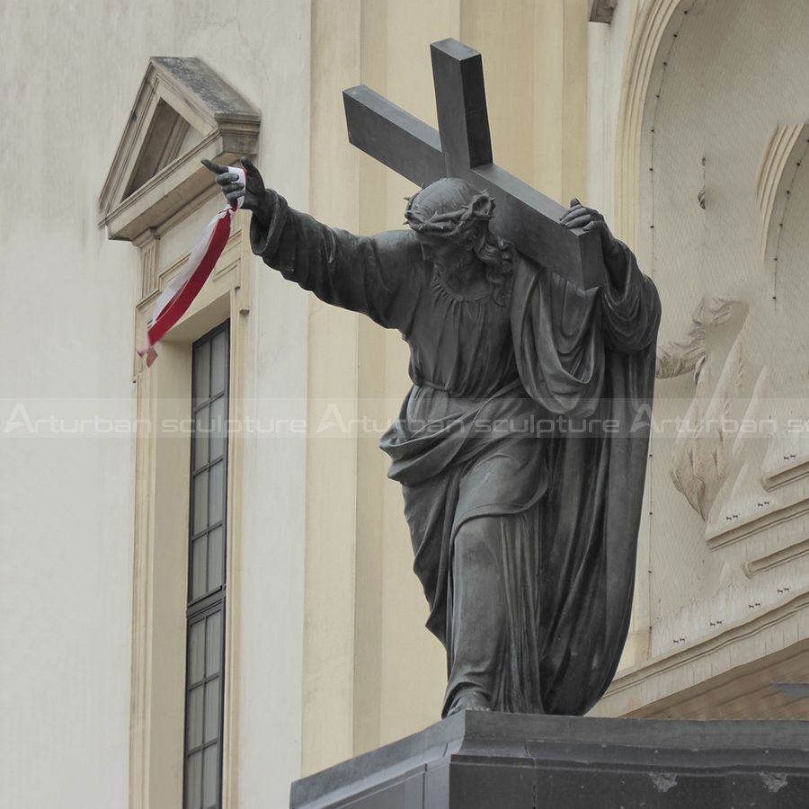 christ carrying the cross statue