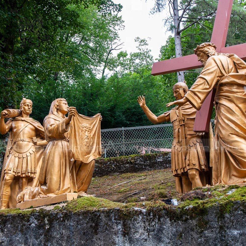 jesus carrying cross statue