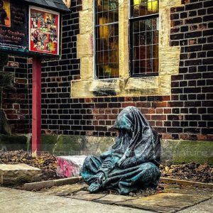 jesus the beggar statue