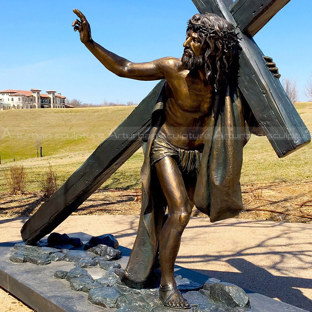 jesus carrying his cross statue