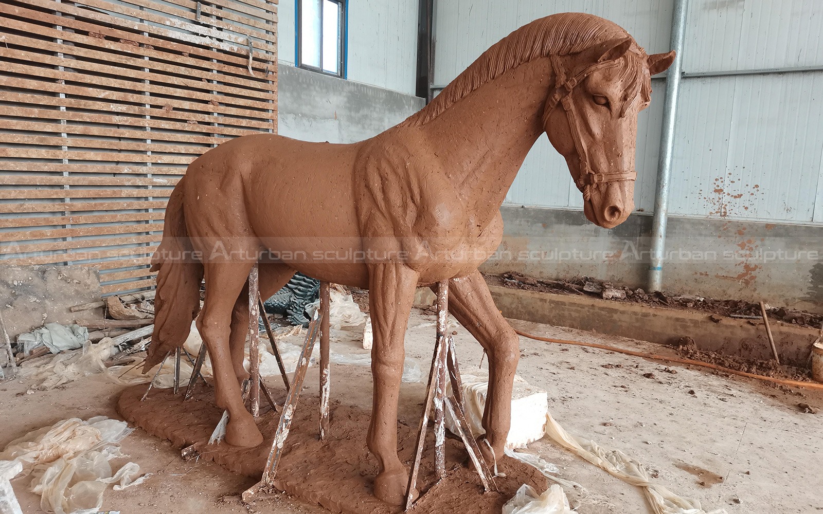 clay mold of horse statue