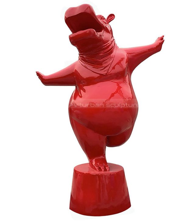 dancing hippo statue