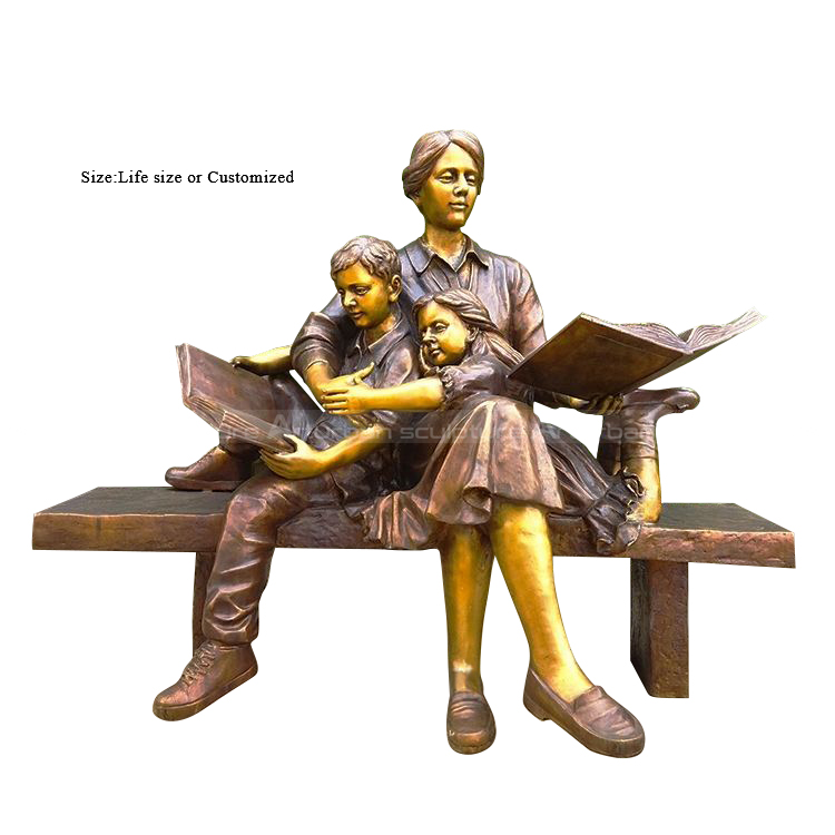 Mother and children reading sculpture