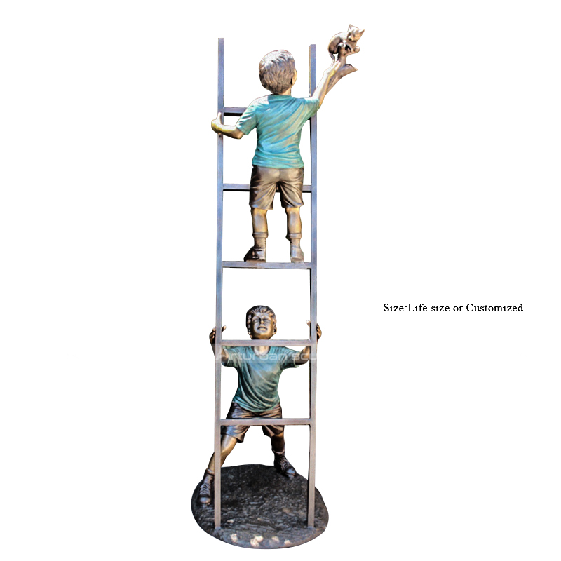 boy statue on ladder statue