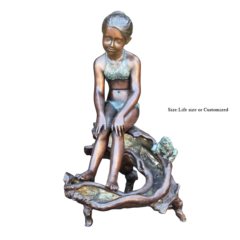 girl with bull frog sculpture