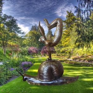 rabbit with snail sculpture