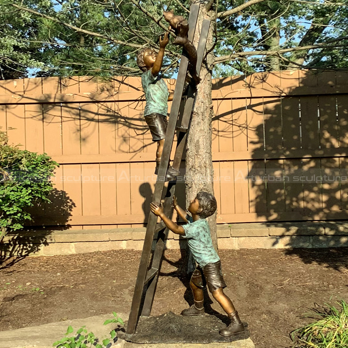 boy statue on ladder statue