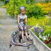 girl with bull frog sculpture