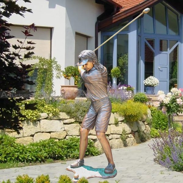 girl playing golf statues