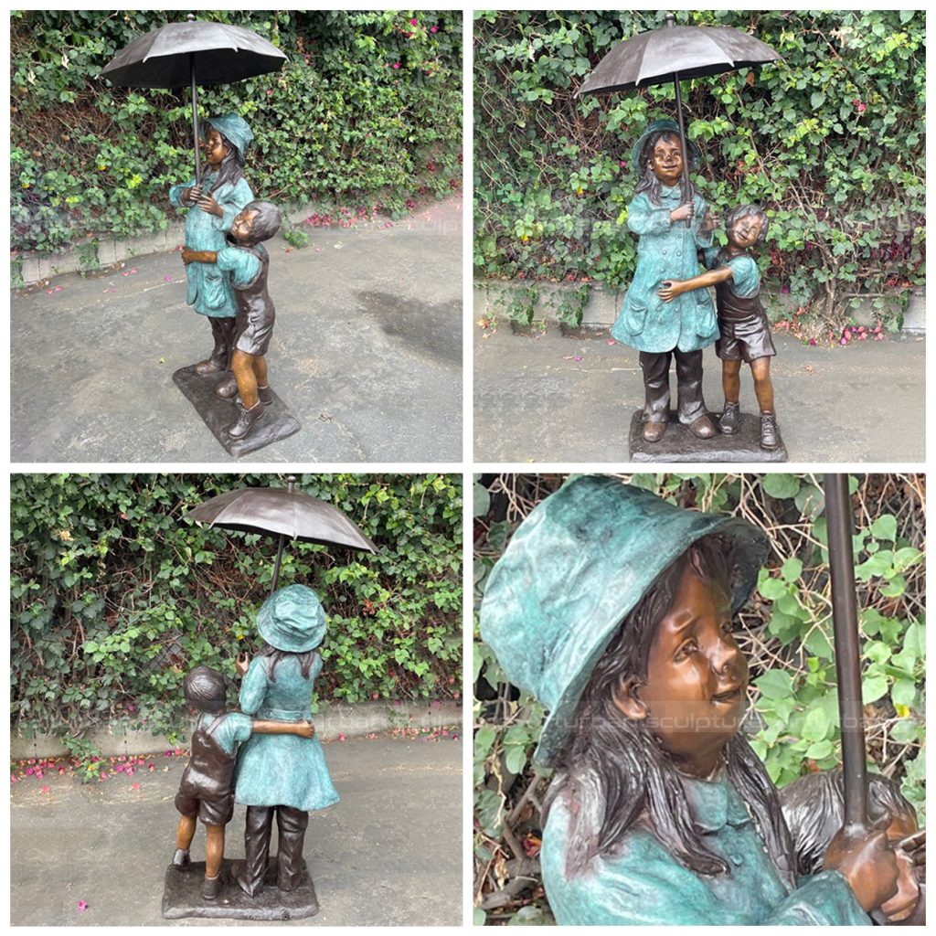 boy and girl under umbrella fountain