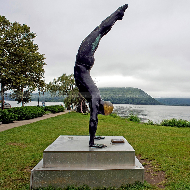 swimming statue