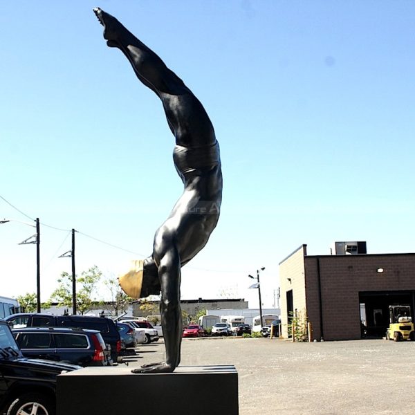 swimming statue
