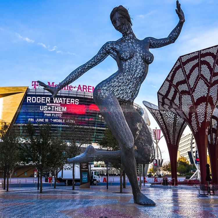 dancing woman statue