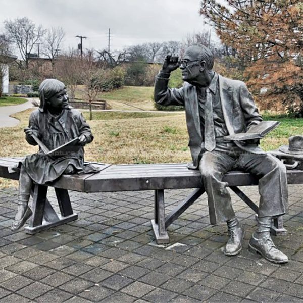 grandfather and granddaughter statue