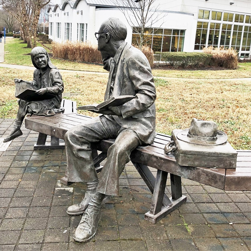 grandfather and granddaughter statue