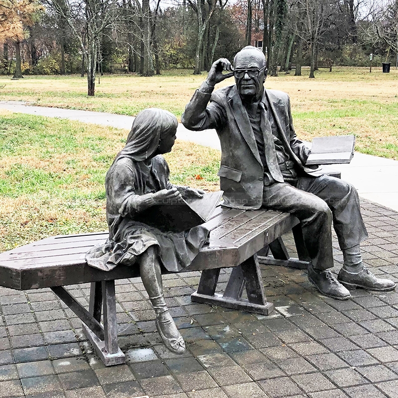 grandfather and granddaughter statue