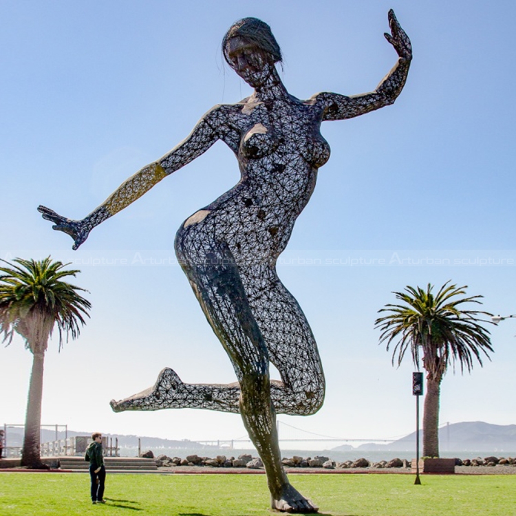 dancing woman statue