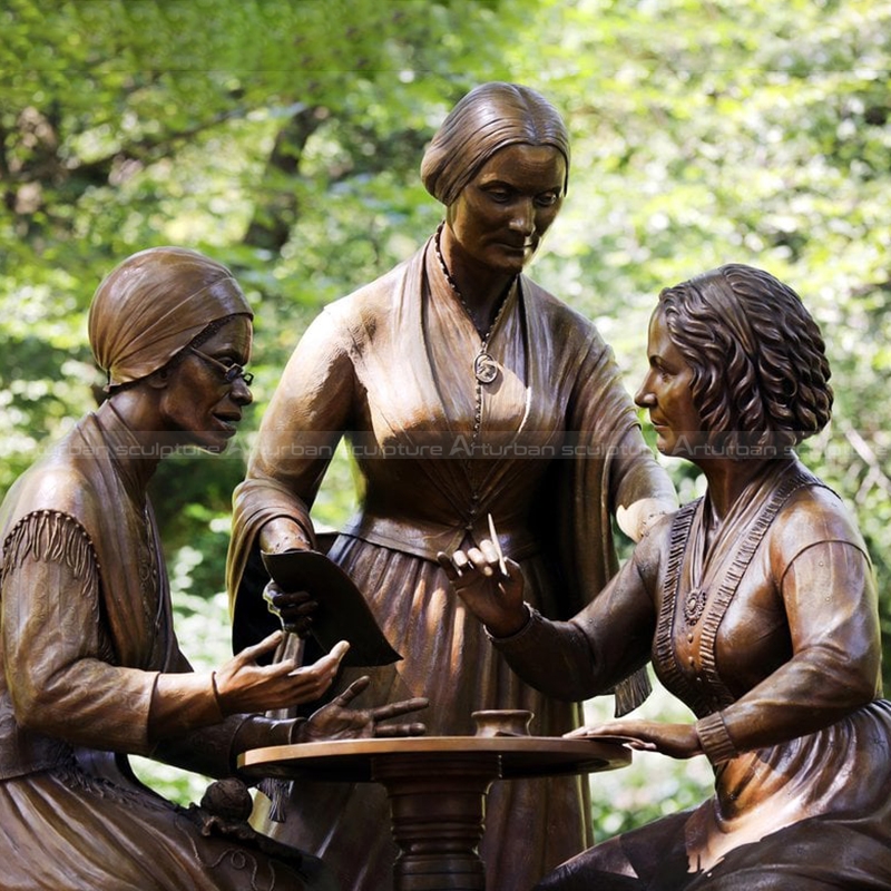 statue of three women