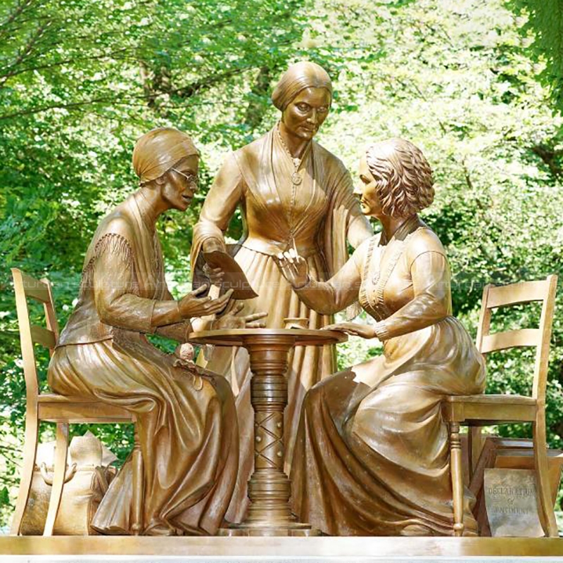 statue of three women