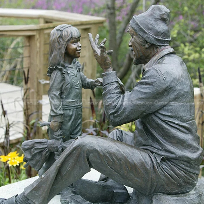 Grandfather and Granddaughter Sculpture