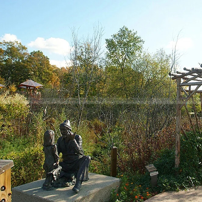 Grandfather and Granddaughter Sculpture