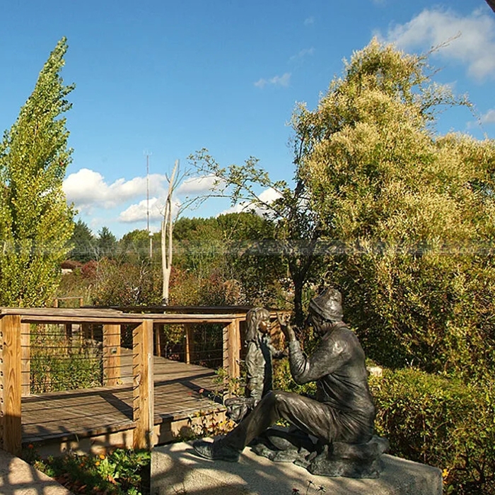 Grandfather and Granddaughter Sculpture