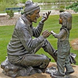 Grandfather and Granddaughter Sculpture