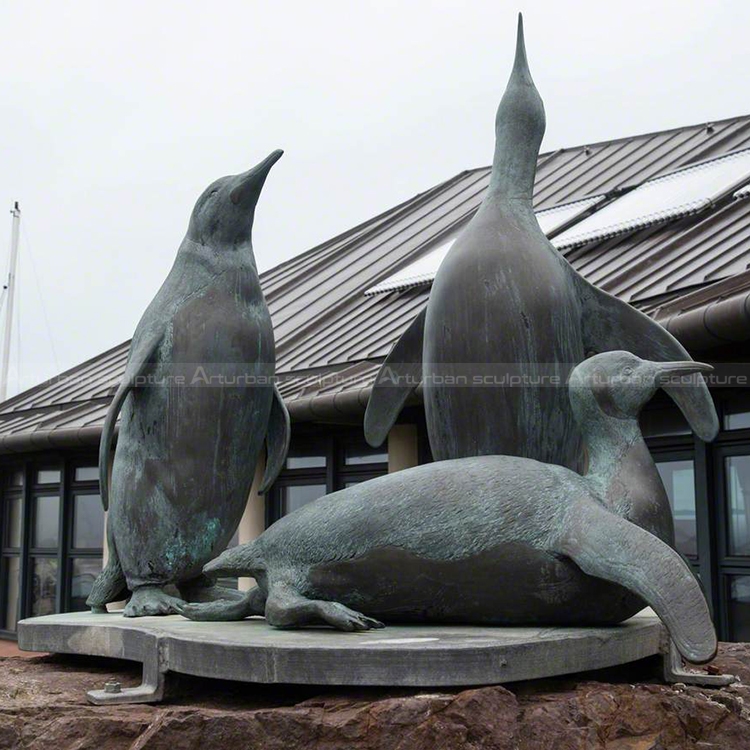 bronze penguin sculpture