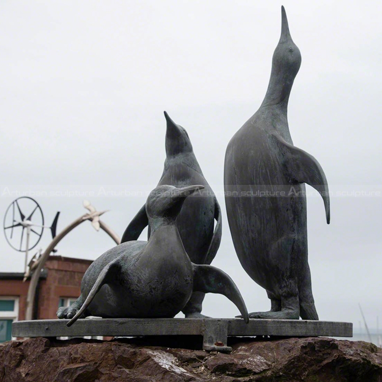 bronze penguin sculpture