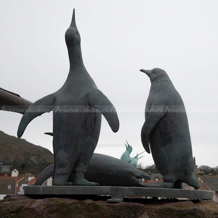 bronze penguin sculpture