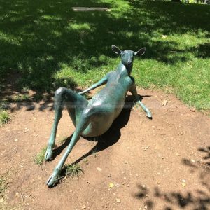 resting deer statue