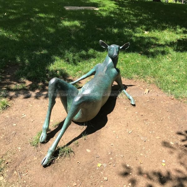 resting deer statue