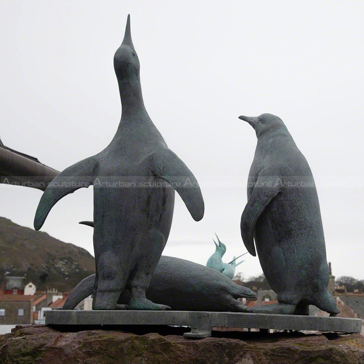 bronze penguin sculpture