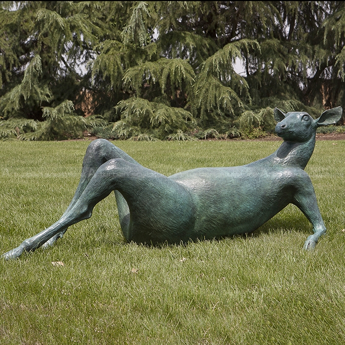 resting deer statue