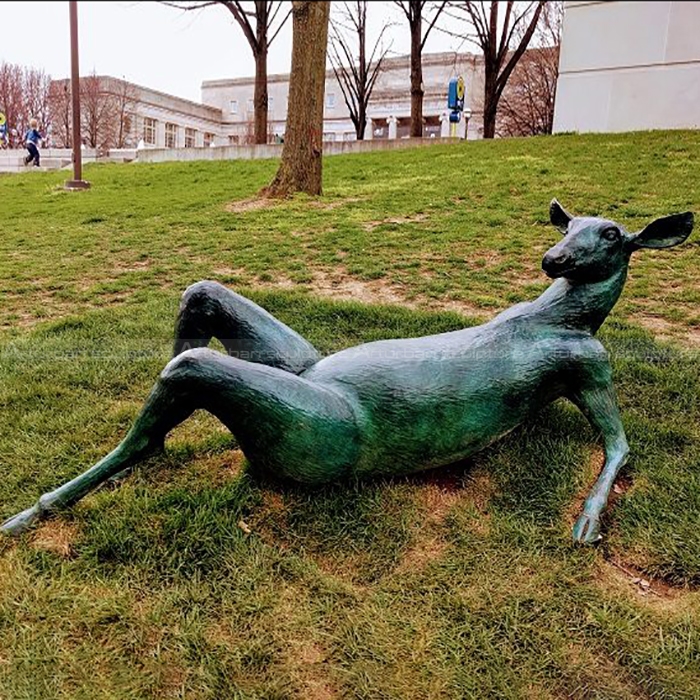 resting deer statue