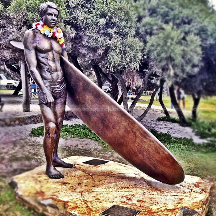 bronze surfer statue