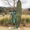 bronze surfer statue