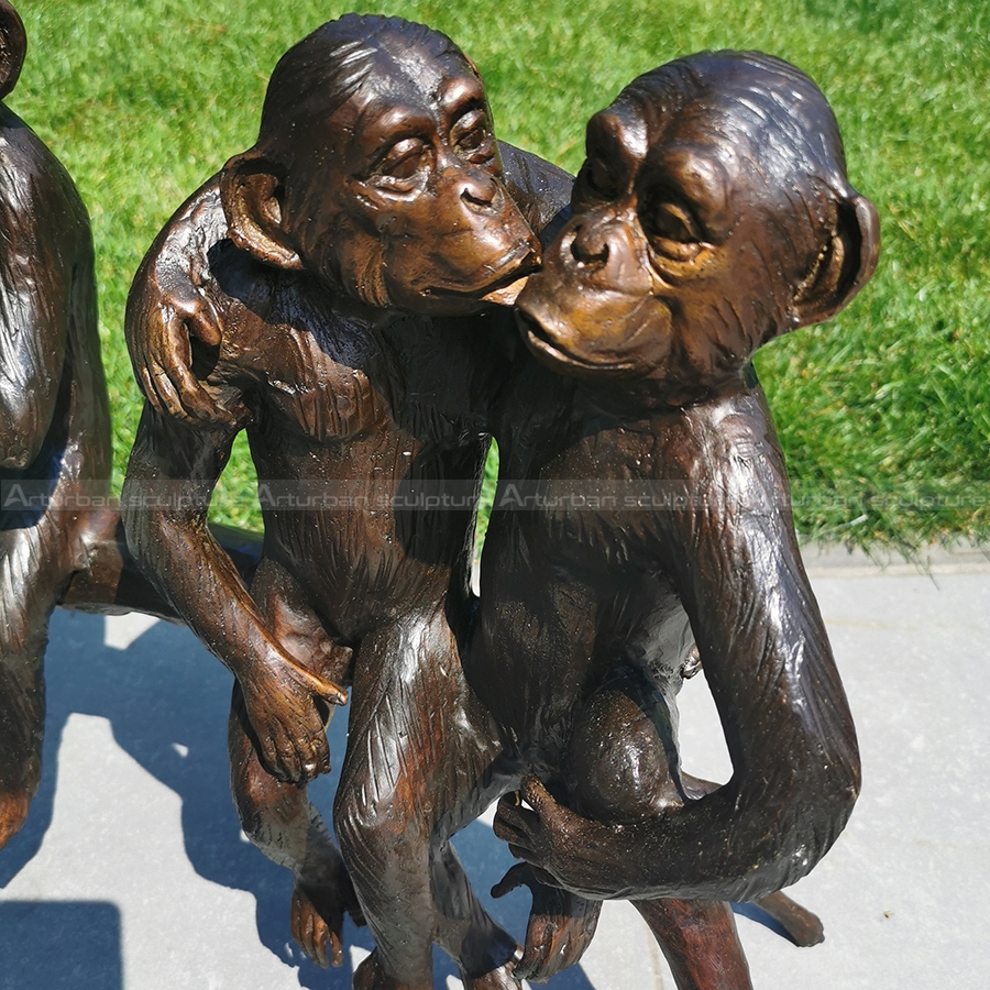 three monkeys sculpture