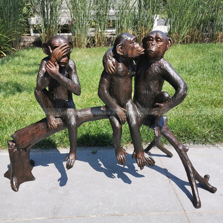 sculpture de trois singes